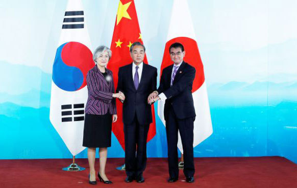 Chinese Foreign Minister Wang Yi meets with his counterparts from both Japan and ROK on Wednesday, August 21, 2019 in Beijing. [Photo: China Plus]