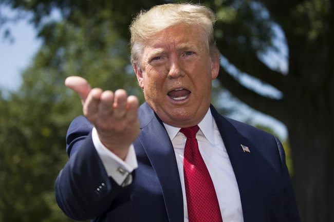 President Donald Trump speaks with reporters before departing on Marine One on the South Lawn of the White House, Wednesday, Aug. 21, 2019, in Washington. Trump is headed to Kentucky. [Photo: AP/Alex Brandon]