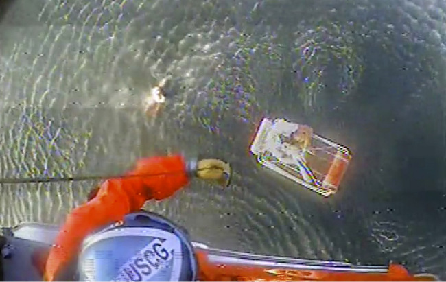 In this Aug. 20, 2019 image provided by the U.S. Coast Guard, a Coast Guard Air Station San Francisco MH-65 Dolphin helicopter crew rescues two people after their plane went down near Half Moon Bay, Calif. A self-professed thrill seeker and pilot was forced to bring down his new plane safely into the ocean off Northern California as it lost power, recording dramatic videos as he and his passenger treaded water in the chilly ocean awaiting rescue. Pilot David Lesh embarked on a flight Tuesday evening over Half Moon Bay south of San Francisco. He's a 34-year-old globe-trotting skier and the founder of a Colorado-based outerwear company Virtik. [Photo: AP]