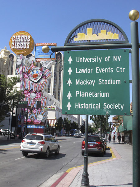 This photo taken Aug. 19, 2019 shows the Circus Circus casino's famous clown in downtown Reno, Nev., a block from the casino-hotel tower where about 1,300 University of Nevada students will live this school year. A gas explosion in July shut down indefinitely the school's two largest residence halls on campus a half-mile away. [Photo: AP/Scott Sonner]