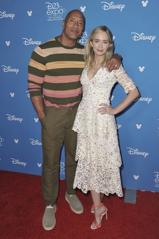 Dwayne Johnson, left, and Emily Blunt attend the Go Behind the Scenes with the Walt Disney Studios press line at the 2019 D23 Expo on Saturday, Aug. 24, 2019, in Anaheim, Calif. [Photo: AP]