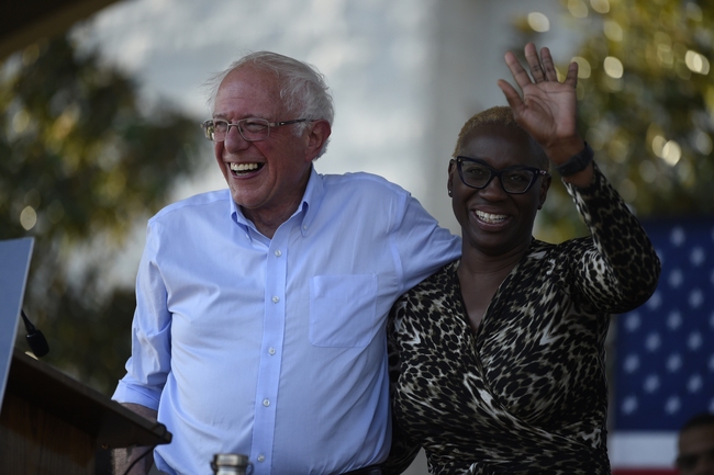 Democratic presidential contender Bernie Sanders smiles with Nina Turner, right, the national co-chair of his presidential campaign, at a Medicare for All town hall gathering on Friday, Aug. 30, 2019, in Florence, S.C. [Photo: AP/Meg Kinnard]