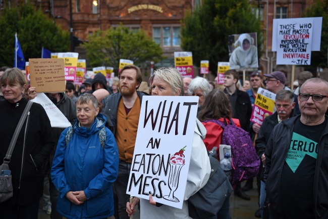 Demonstrators gather to protest against the government's move to suspend parliament in the final weeks before Brexit in Manchester, northwest England, on September 2, 2019. [Photo: AFP]
