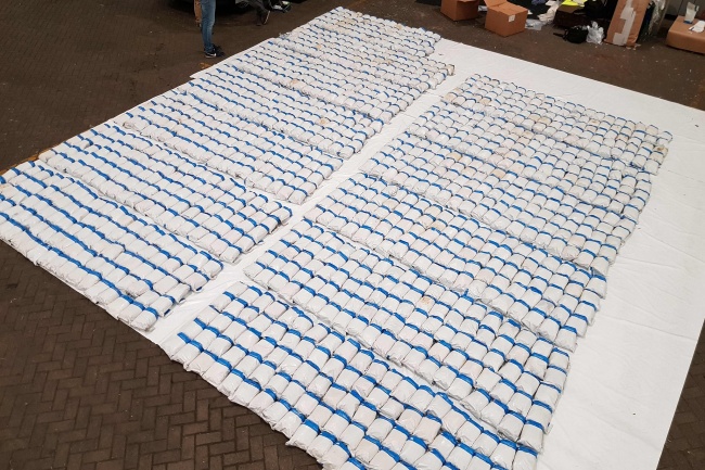 A handout picture released by the National Crime Agency (NCA) on September 3, 2019 and taken on August 31, 2019 shows packages of heroin seized from a container ship at the southern England port of Felixstowe on August 30, 2019. An international operation has netted the largest ever heroin seizure in Britain, the National Crime Agency (NCA) said on September 3, 2019, with nearly 1.3 tonnes recovered from a container ship. [Photo: NATIONAL CRIME AGENCY/AFP via VCG]