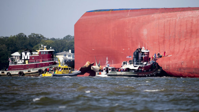 A pilot boat pulls up to the site where rescuers are working on the cargo ship Golden Ray as it lays capsized near the Port of Brunswick, Ga., on the Georgia coast, Monday, Sept. 9, 2019, in Jekyll Island, Ga. [Photo: AP via IC/Stephen B. Morton]