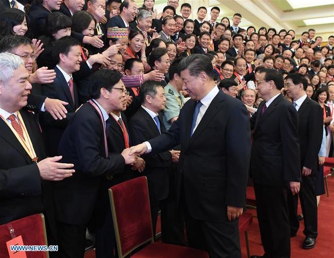 Chinese President Xi Jinping meets with representatives of outstanding units and individuals in education circles at the Great Hall of the People in Beijing, on Sept. 10, 2019. [Photo: Xinhua]