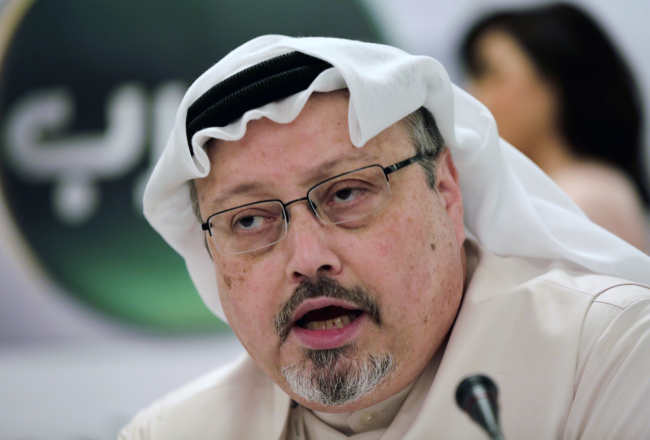In this Dec. 15, 2014 file photo, Saudi journalist Jamal Khashoggi speaks during a press conference in Manama, Bahrain. A Turkish newspaper says in his final words, slain Saudi journalist Jamal Khashoggi urged his killers not to cover his mouth because he suffered from asthma and could suffocate. The Sabah newspaper on Tuesday, Sept. 10, 2019 published new excerpts of a recording of Khashoggi's conversation with members of a Saudi hit squad sent to kill him. [File Photo: AP/Hasan Jamali]