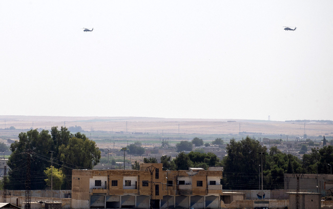 The Turkish and U.S. armed forces start their fourth joint helicopter flight for a planned safe zone in northern Syria, in Sanliurfa, Turkey on September 12, 2019. [Photo: Anadolu Agency via IC]