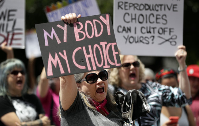 In this May 21, 2019 file photo, a group gathers to protest abortion restrictions at the State Capitol in Austin, Texas. [Photo: AP]