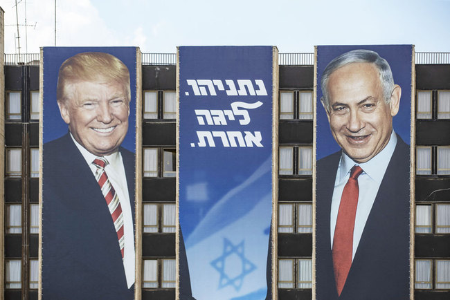 Posters of Israel's Prime Minister Benjamin Netanyahu and U.S. President Donald Trump are seen ahead of the General elections in Jerusalem on September 16, 2019. [File photo: Anadolu Agency/ABACAPRESS.COM via IC]