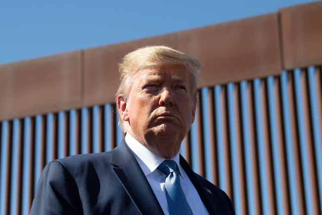 US President Donald Trump visits the US-Mexico border fence in Otay Mesa, California on September 18, 2019. [File photo: AFP/Nicholas Kamm]