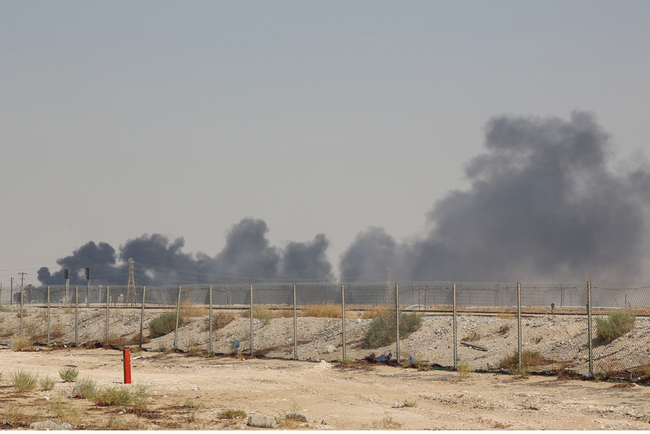 Smoke billows from an Aramco oil facility in Abqaiq about 60km (37 miles) southwest of Dhahran in Saudi Arabia's eastern province on September 14, 2019. [File photo: AFP]