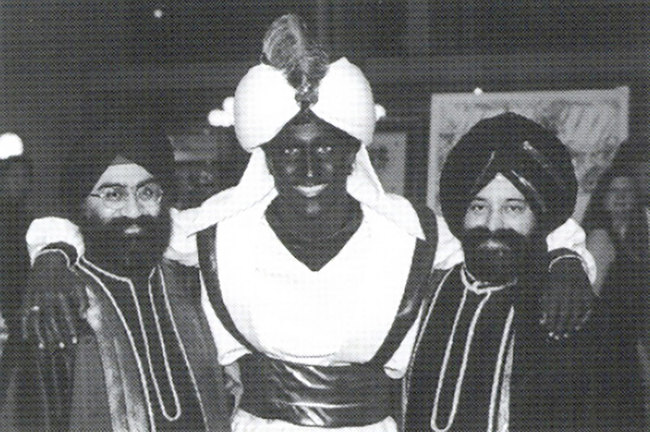 This April 2001 photo, which appeared in a newsletter from the West Point Grey Academy, shows a costumed Justin Trudeau, his face and hands darkened by makeup, attending an "Arabian Nights" gala. [Photo: AP]