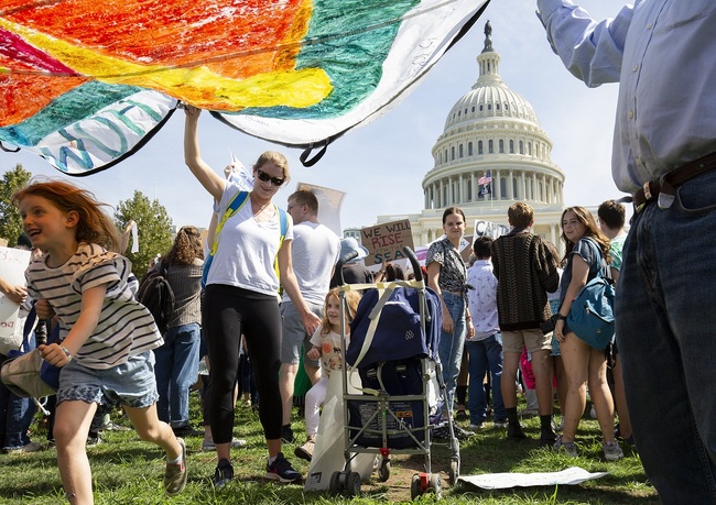 Students and activists march near the US Capitol during the Global Climate Strike march in Washington, DC on September 20, 2019. [Photo: AFP/Alastair Pike]