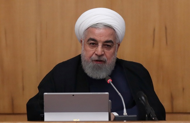 A handout photo made available by the presidential office shows Iranian President Hassan Rouhani speaking during the cabinet meeting in Tehran, Iran, September 18, 2019. [File Photo: EPA via IC]