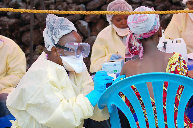 A girl receives a vaccine against Ebola from a nurse in Goma on August 7, 2019. [File Photo: AFP/Augustin Wamenya]