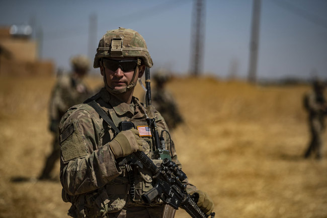 A US soldier takes part in a joint patrol with Turkish troops in the Syrian village of al-Hashisha on the outskirts of Tal Abyad town along the border with Turkish troops, on September 8, 2019. [Photo: AFP]