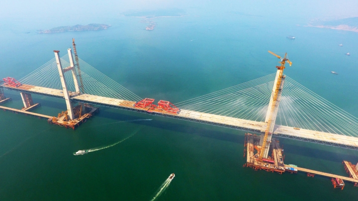 China Completes World's Longest Cross-sea Road-rail Bridge - China Plus