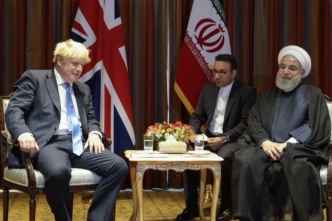 A handout picture provided by the office of Iranian President Hassan Rouhani on September 24, 2019 shows him (R) meeting with British Prime Minister Boris Johnson (L) on the sidelines of the 74th United Nations General Assembly in New York. [Photo: HO/Iranian Presidency/AFP]