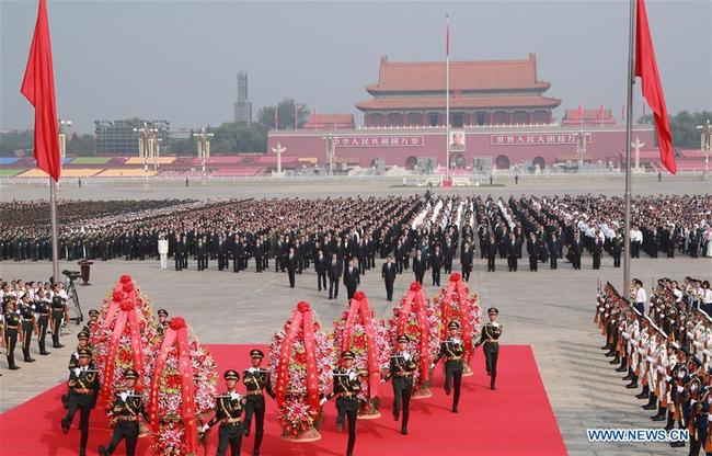 Xi Jinping and other leaders of the Communist Party of China (CPC) and the state, including Li Keqiang, Li Zhanshu, Wang Yang, Wang Huning, Zhao Leji, Han Zheng and Wang Qishan, attend a ceremony held to pay tribute to deceased national heroes on the Martyrs' Day at the Tian'anmen Square in Beijing, capital of China, September 30, 2019. [Photo: Xinhua/Pang Xinglei]