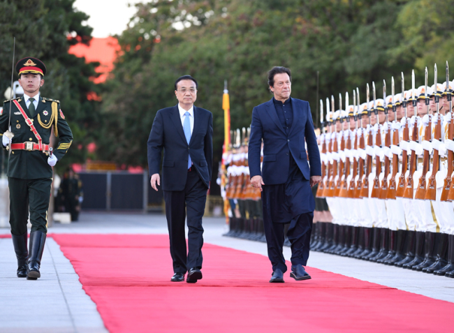Chinese Premier Li Keqiang holds a welcome ceremony for visiting Pakistani Prime Minister Imran Khan before their talks in Beijing, capital of China, Oct. 8, 2019. [Photo: gov.cn]