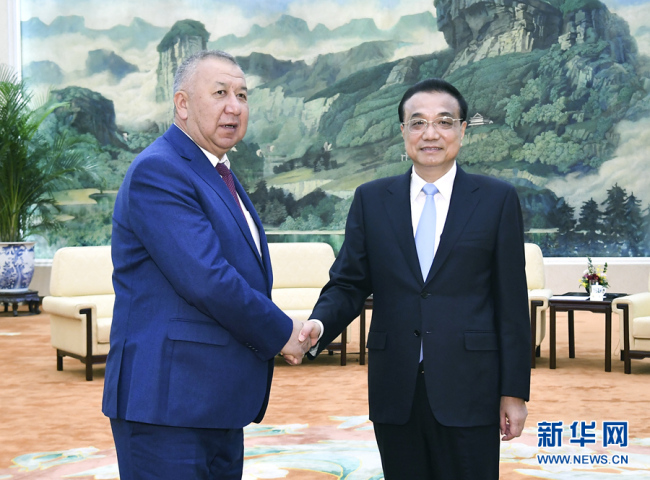 Chinese Premier Li Keqiang meets with Kyrgyz First Deputy Prime Minister Kubatbek Boronov in Beijing, on Wednesday, October 09, 2019. [Photo: Xinhua]