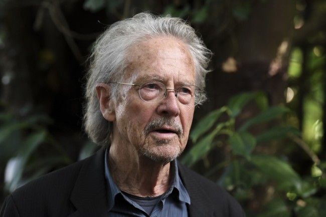 Austrian writer Peter Handke poses in Chaville, in the Paris suburbs, on October 10, 2019 after he was awarded with the 2019 Nobel Literature Prize. [Photo: AFP]