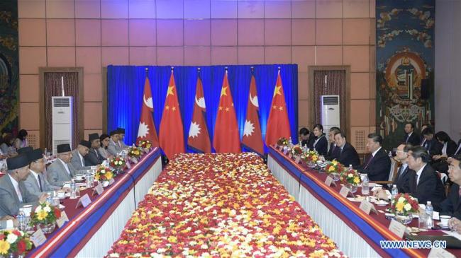 Chinese President Xi Jinping holds talks with Nepali Prime Minister K.P. Sharma Oli in Kathmandu, Nepal, Oct. 13, 2019. [Photo: Xinhua/Li Xueren]
