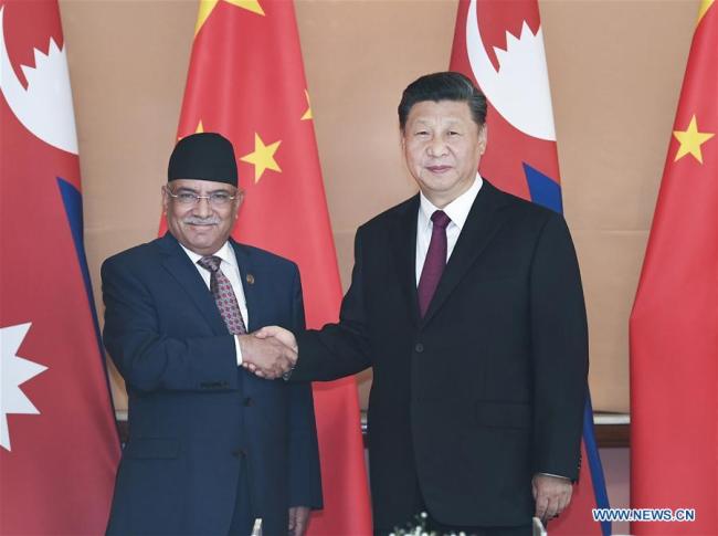 Chinese President Xi Jinping meets with co-chairman of the Nepal Communist Party (NCP) Pushpa Kamal Dahal, also known as Prachanda, in Kathmandu, Nepal, Oct. 13, 2019. [Photo: Xinhua/Xie Huanchi]