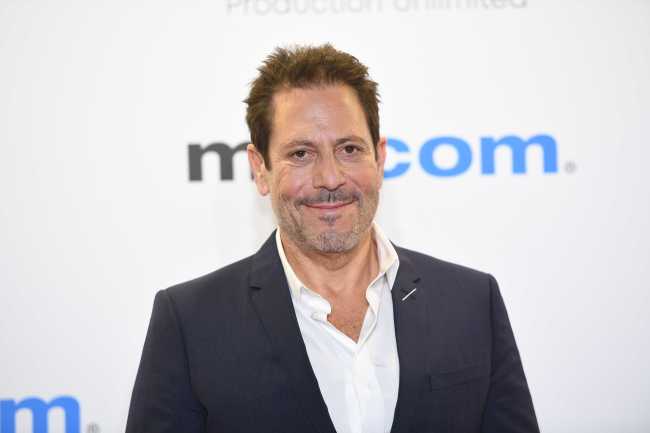 Darren Star attends the opening ceremony of the MIPCOM 2019 on October 14th, 2019 in Cannes, France. [Photo: IC]