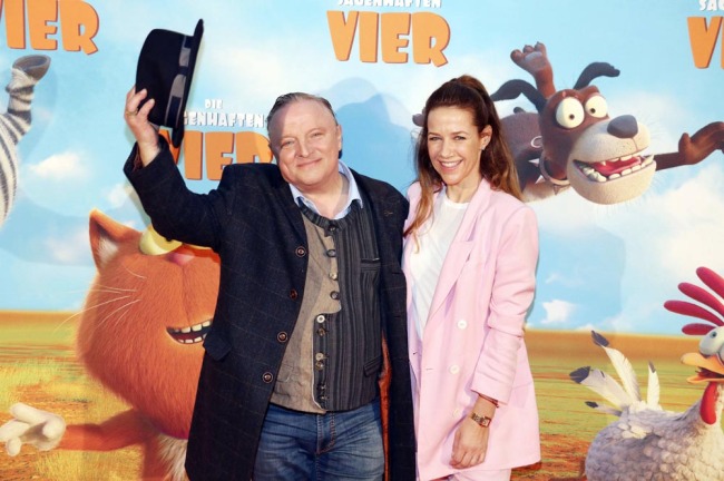 Alexandra Neldel and Axel Prahl at the premiere of the animated film Die sagenhaften Vier Marnie s World at the Kulturbrauerei Berlin June 4, 2019. [Photo: IC]