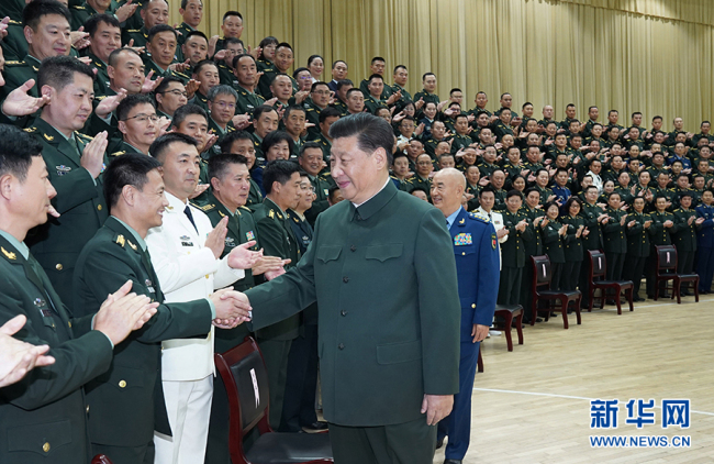 Chinese President Xi Jinping meets with delegates to the first Party congress of the People's Liberation Army (PLA) Joint Logistic Support Force and senior officers stationed in central China's Hubei Province, October 18, 2019. [Photo: Xinhua]