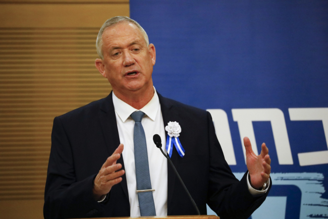 Blue and white party leader Benny Gantz speak during his party's faction meeting in Jerusalem, Thursday, Oct. 3, 2019, ahead of swearing in of the new Israel's parliament. [Photo: AP/Ariel Schalit]