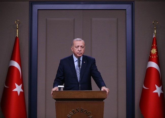 A handout picture taken on October 22, 2019, shows Turkish President Recep Tayyip Erdogan attending a press conference before his meeting with the Russian President in the Russian seaside resort of Sochi. [Photo: Murat KULA / TURKISH PRESIDENCY PRESS OFFICE / AFP]