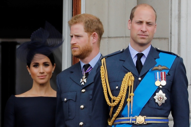 In this file photo taken on July 10, 2018 (L-R) Britain's Meghan, Duchess of Sussex, Britain's Prince Harry, Duke of Sussex, Britain's Prince William, Duke of Cambridge and Britain's Catherine, Duchess of Cambridge, stand on the balcony of Buckingham Palace to watch a military fly-past to mark the centenary of the Royal Air Force (RAF). [Photo: Tolga AKMEN/AFP]