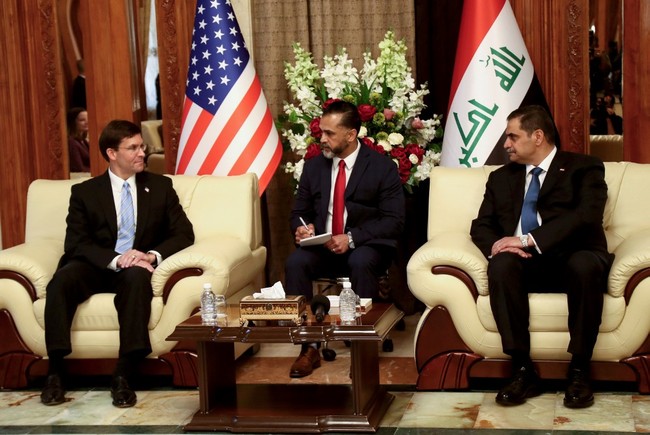 A handout picture released by the Iraq's Defence Ministry shows US Defence Secretary Mark Esper (L) during a meeting with his Iraqi counterpart Najah al-Shammari (R) upon the Pentagon chief's arrival in Baghdad on October 23, 2019. [Photo: AFP/ HO / IRAQI DEFENCE MINISTRY]