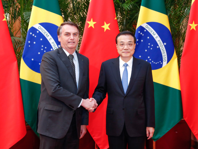 Chinese Premier Li Keqiang meets with Brazilian President Jair Messias Bolsonaro on Friday in Beijing, October 25, 2019. [Photo: Xinhua]