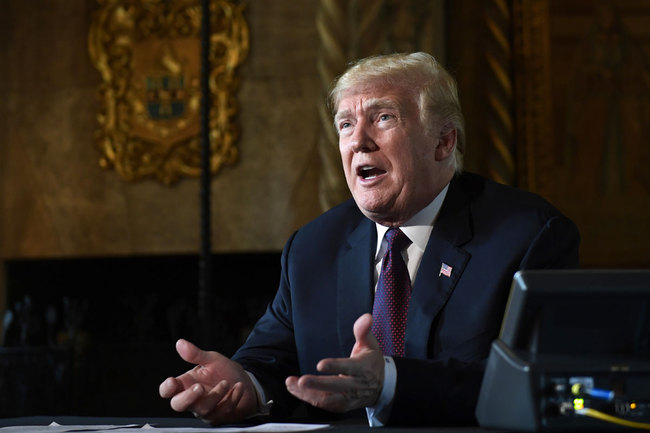 In this Thursday, Nov. 22, 2018 file photo, President Donald Trump speaks to reporters following his teleconference with troops from his Mar-a-Lago estate in Palm Beach, Fla. [Photo: AP]