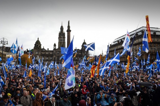 Pro Scottish Independence campaigners listen as Scottish Nationalist Party (SNP) leader Nicola Sturgeon, Scotland's First Minister addresses a rally calling for Scottish independence in Glasgow on November 2, 2019. [Photo: AFP/ Andy Buchanan] 