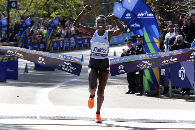 Joyciline Jepkosgei, of Kenya, crosses the finish line to win the Pro Women's Division of the New York City Marathon, in New York's Central Park, Sunday, Nov. 3, 2019. [Photo: AP]