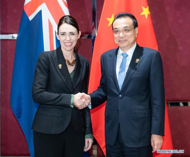 Chinese Premier Li Keqiang meets with New Zealand Prime Minister Jacinda Ardern in Bangkok, Thailand, Nov. 4, 2019. [Photo: Xinhua/Zhai Jianlan]