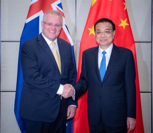 Chinese Premier Li Keqiang and his Australian counterpart Scott Morrison hold the seventh annual meeting between the heads of government of the two countries on the sidelines of a series of leaders' meetings on East Asian cooperation in Bangkok, Thailand, Nov. 3, 2019. [Photo: Xinhua/Zhai Jianlan]