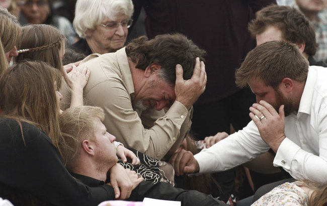 David Langford is consoled during the funeral service for his wife Dawna Ray and their two sons, in La Mora, Mexico, Thursday, Nov. 7, 2019. [Photo: AP/Christian Chavez]