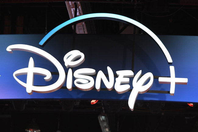 In this file photo taken on August 23, 2019 a Disney+ streaming service sign is pictured at the D23 Expo, billed as the "largest Disney fan event in the world," at the Anaheim Convention Center in Anaheim, California. [Photo: AFP]