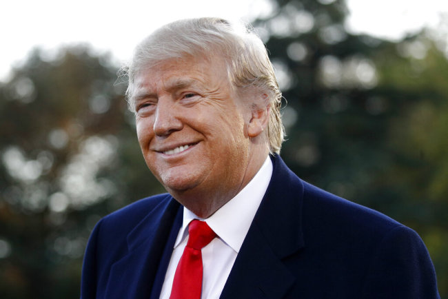 President Donald Trump speaks to members of the media on the South Lawn of the White House in Washington, Monday, Nov. 4, 2019, before boarding Marine One for a short trip to Andrews Air Force Base, Md., and then on to Lexington, Ky., for a campaign rally. [Photo: AP]