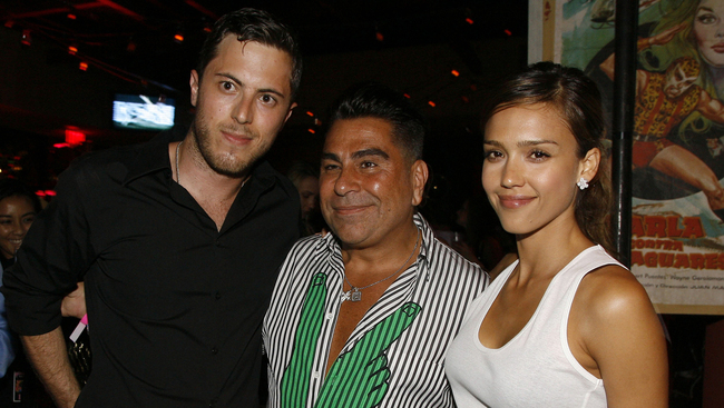 In this June 28, 2007 file photo, Harry Morton, left, Luis Barajas, center, founder of Flaunt magazine, and Jessica Alba are seen at the opening of the Pink Taco restaurant in Los Angeles. [Photo: AP]