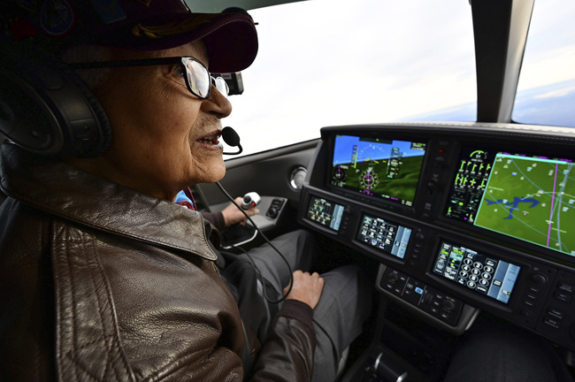 Retired U.S. Air Force Col. Charles McGee, a Tuskegee Airman and a decorated veteran of three wars, flies a Cirrus SF50 Vision Jet with assistance from pilot Boni Caldeira during a round trip flight from Frederick, Maryland, to Dover Air Force Base in Delaware to help celebrate McGee's 100th birthday, Friday, Dec. 6, 2019. McGee's birthday is Dec. 7. [Photo: AP]