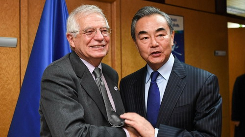 Chinese State Councilor and Foreign Minister Wang Yi (R) talks with EU High Representative Josep Borrell, Madrid, Spain, December 15, 2019. [Photo: Chinese Foreign Ministry]