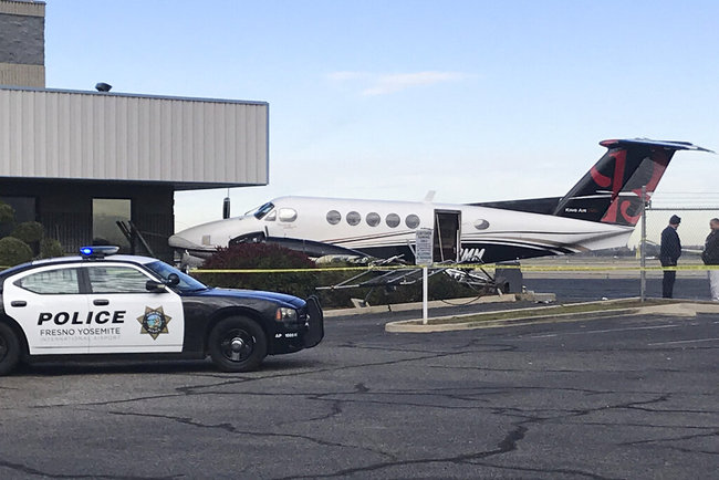 A small plane sits parked after it was crashed into a fence by a 17-year-old girl Wednesday, Dec. 18, 2019, at the Fresno Yosemite International Airport in Fresno, Calif. [Photo: AP]