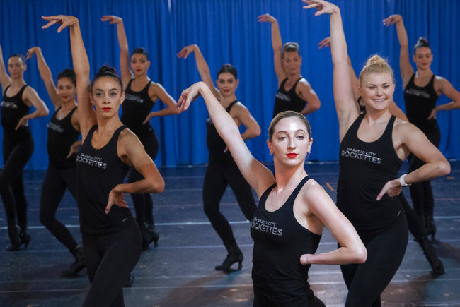 In this Oct. 22, 2019 photo, Rockette Sydney Mesher center right, takes part in a rehearsal at the Rockette's rehearsal space in New York. [Photo: AP]